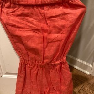 Orange- red jumper-elastic is a little stretched